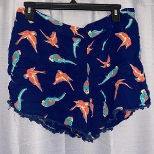 Flowy blue shorts with birds